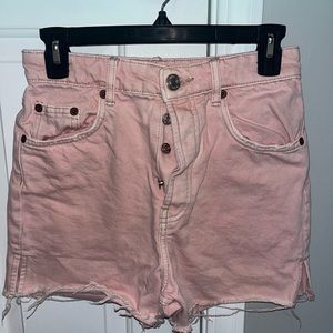 Pink denim cut-off shorts